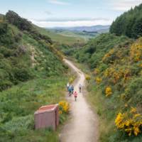 Cyclists riding along the Clutha Gold Trail | Geoff Marks