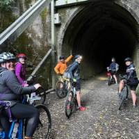 Cyclist head into Spooners Tunnel on the Great Taste Trail | Brett Leyden