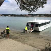 Boarding the Mapua Ferry after a stunning ride on Rabbit Island | Chris Cameron